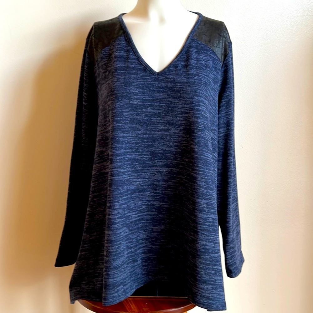 Jones wear long sleeve with accents on the shoulders